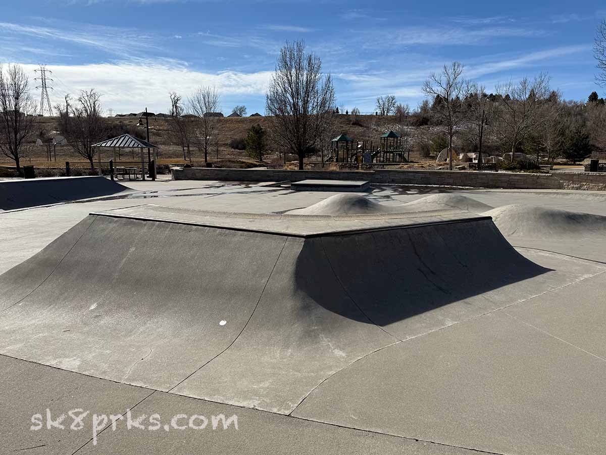 Skyline Park Skatepark 2' quarter pipe and bank